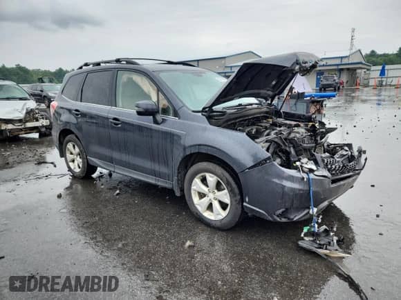 2014 Subaru Forester Touring with VIN JF2SJAPC2EH504023, listed as a Copart auction lot 67115945 with 218,794 mi miles and Salvage title. Bid and sale history available at DreamBid. Image 4.
