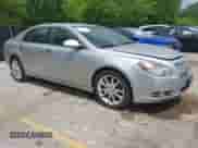 2012 Chevrolet Malibu LTZ 1LZ z VIN 1G1ZE5E09CF285242, wystawiony jako IAAI lot #42271615 z przebiegiem 137 255 mil mil oraz . Historia ofert i sprzedaży dostępna na DreamBid. Obrazek 1.