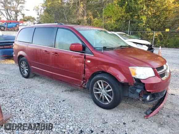 2014 Dodge Grand Caravan SXT 30th Anniversary with VIN 2C4RDGCG2ER462554, listed as a Copart auction lot 86085115 with 101,691 mi miles and Salvage title. Bid and sale history available at DreamBid. Image 4.
