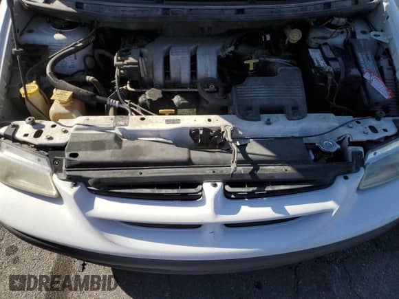 1999 Dodge Caravan SE z VIN 1B4GP45G9XB600440, wystawiony jako Copart lot #58417195 z przebiegiem 102 364 mil mil oraz Czysty tytuł • Clean title. Historia ofert i sprzedaży dostępna na DreamBid. Obrazek 12.