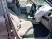 2013 Honda Pilot EX-L with VIN 5FNYF4H57DB082731, listed as a IAAI auction lot 43203205 with 96,017 mi miles and . Bid and sale history available at DreamBid. Image 5.