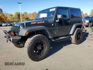 2012 Jeep Wrangler Sport with VIN 1C4AJWAG5CL113509, listed as a Copart auction lot 87483435 with 173,046 mi miles and Clean title. Bid and sale history available at DreamBid. Image 1.