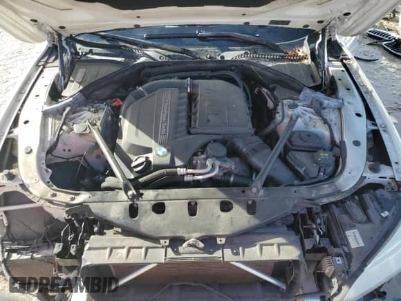 2015 BMW 7 Series 740i z VIN WBAYA6C56FGK16426, wystawiony jako Copart lot #84919965 z przebiegiem 147 719 mil mil oraz Szkoda całkowita • Salvage title. Historia ofert i sprzedaży dostępna na DreamBid. Obrazek 11.