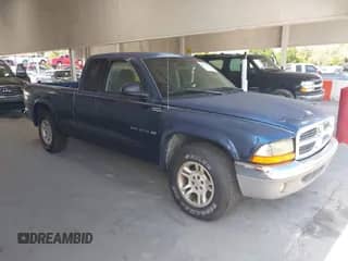 2002 Dodge Dakota SLT with VIN 1B7GL42X02S557196, listed as a IAAI auction lot 42518750 with Not provided miles and . Bid and sale history available at DreamBid. Image 1.
