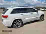 2017 Jeep Grand Cherokee Overland with VIN 1C4RJECG8HC965161, listed as a Copart auction lot 82068045 with 99,654 mi miles and Salvage title. Bid and sale history available at DreamBid. Image 3.