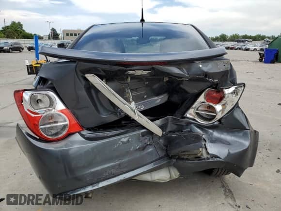 2013 Chevrolet Sonic LTZ с VIN 1G1JE5SH0D4102525, выставлен на аукционе Copart как лот 60976595 с пробегом 138 420 миль миль и Списание • Salvage title. История ставок и продаж доступна на DreamBid. Изображение 6.