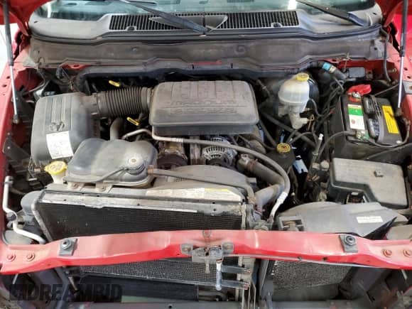 2002 Dodge 1500 z VIN 1D7HU16N22J162411, wystawiony jako Copart lot #89859335 z przebiegiem 94 151 mil mil oraz Czysty tytuł • Clean title. Historia ofert i sprzedaży dostępna na DreamBid. Obrazek 11.