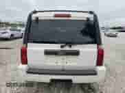 2006 Jeep Commander with VIN 1J8HH48N06C352871, listed as a Copart auction lot 87740115 with 163,703 mi miles and Salvage title. Bid and sale history available at DreamBid. Image 6.