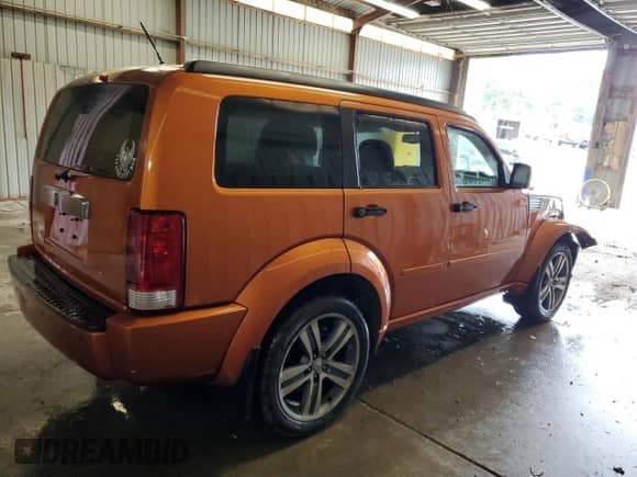 2011 Dodge Nitro Shock z VIN 1D4PU7GX8BW590952, wystawiony jako Copart lot #64893755 z przebiegiem 135 449 mil mil oraz Szkoda całkowita • Salvage title. Historia ofert i sprzedaży dostępna na DreamBid. Obrazek 3.