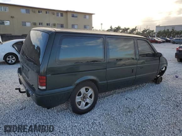 1993 Dodge Caravan Grand SE with VIN 1B4GH44R0PX686790, listed as a Copart auction lot 83757254 with 287,137 mi miles and Salvage title. Bid and sale history available at DreamBid. Image 3.