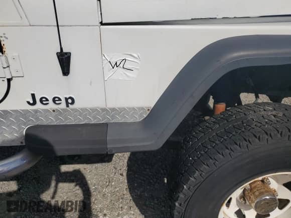 1992 Jeep Wrangler z VIN 2J4FY19P8NJ516508, wystawiony jako Copart lot #79809654 z przebiegiem Nie podano mil oraz Szkoda całkowita • Salvage title. Historia ofert i sprzedaży dostępna na DreamBid. Obrazek 12.