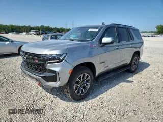 2023 Chevrolet Tahoe Z71 with VIN 1GNSKPKD0PR521471, listed as a Copart auction lot 65339615 with 57,973 mi miles and Salvage title. Bid and sale history available at DreamBid. Image 1.