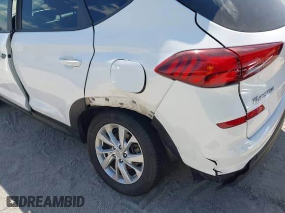 2020 Hyundai Tucson SE with VIN KM8J2CA43LU218315, listed as a IAAI auction lot 43084337 with 32,108 mi miles and . Bid and sale history available at DreamBid. Image 6.