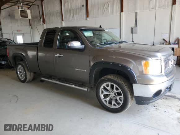 2011 GMC Sierra 1500 SLT with VIN 1GTR2WE38BZ298352, listed as a Copart auction lot 52939545 with 171,313 mi miles and Salvage title. Bid and sale history available at DreamBid. Image 4.