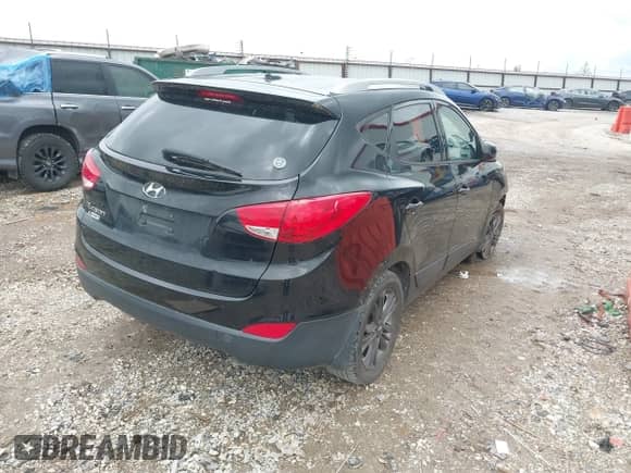 2014 Hyundai Tucson Limited z VIN KM8JU3AG0EU793415, wystawiony jako IAAI lot #42198206 z przebiegiem 158 113 mil mil oraz . Historia ofert i sprzedaży dostępna na DreamBid. Obrazek 4.