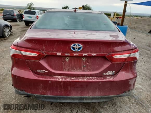 2019 Toyota Camry Hybrid LE с VIN 4T1B21HK0KU013577, выставлен на аукционе Copart как лот 69117375 с пробегом 99 364 миль миль и Списание • Salvage title. История ставок и продаж доступна на DreamBid. Изображение 6.