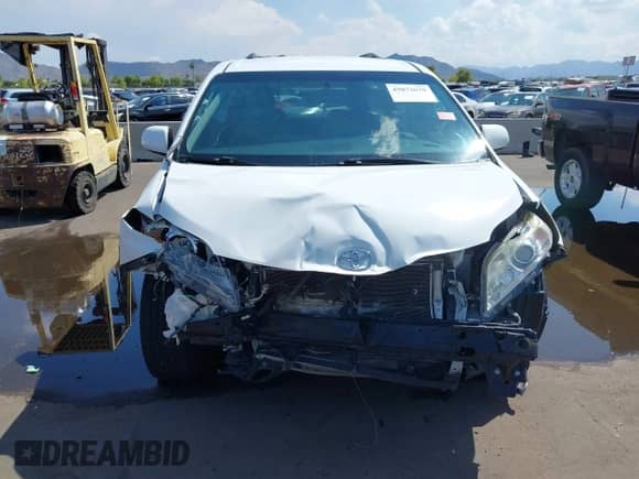 2015 Toyota Sienna LE AAS with VIN 5TDKK3DC8FS646613, listed as a IAAI auction lot 43073670 with 117,828 mi miles and . Bid and sale history available at DreamBid. Image 12.