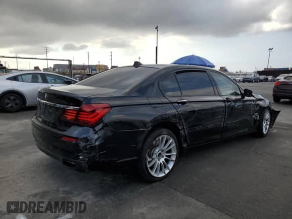 2014 BMW 7 Series 740Li с VIN WBAYE4C58ED138448, выставлен на аукционе Copart как лот 54923875 с пробегом Не указан миль и Списание • Salvage title. История ставок и продаж доступна на DreamBid. Изображение 3.