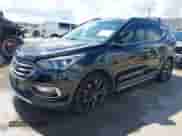 2017 Hyundai Santa Fe Ultimate z VIN 5NMZWDLA1HH039533, wystawiony jako IAAI lot #42591353 z przebiegiem 80 375 mil mil oraz . Historia ofert i sprzedaży dostępna na DreamBid. Obrazek 2.