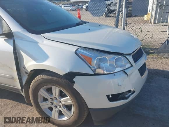 2012 Chevrolet Traverse 2LT with VIN 1GNKRJED0CJ258153, listed as a IAAI auction lot 42948761 with 191,550 mi miles and . Bid and sale history available at DreamBid. Image 6.