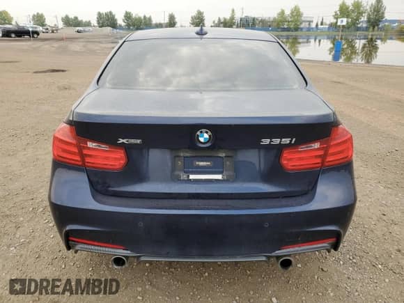 2015 BMW 3 Series 335i xDrive with VIN WBA3B9C51FP705311, listed as a Copart auction lot 71154505 with 152,497 mi miles and Salvage title. Bid and sale history available at DreamBid. Image 6.