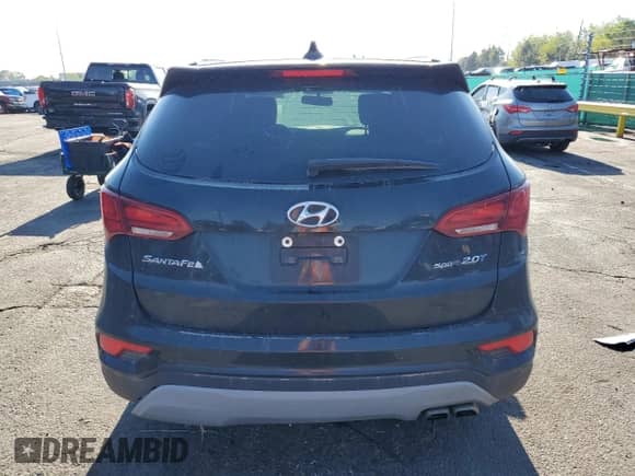 2018 Hyundai Santa Fe 2.0T с VIN 5NMZU4LA7JH107698, выставлен на аукционе Copart как лот 56174225 с пробегом 106 681 миль миль и Списание • Salvage title. История ставок и продаж доступна на DreamBid. Изображение 6.