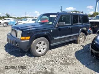 2007 Jeep Commander Sport with VIN 1J8HG48NX7C693408, listed as a Copart auction lot 71632305 with 227,322 mi miles and Salvage title. Bid and sale history available at DreamBid. Image 1.