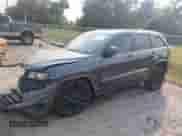 2017 Jeep Grand Cherokee Laredo with VIN 1C4RJEAG0HC702780, listed as a IAAI auction lot 41578964 with 119,331 mi miles and . Bid and sale history available at DreamBid. Image 2.