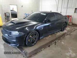 2018 Dodge Charger SRT Hellcat with VIN 2C3CDXL9XJH272285, listed as a Copart auction lot 64979985 with 80,592 mi miles and Salvage title. Bid and sale history available at DreamBid. Image 1.
