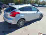 2014 Ford Focus Titanium with VIN 1FADP3N29EL275841, listed as a IAAI auction lot 43398580 with 151,792 mi miles and . Bid and sale history available at DreamBid. Image 4.