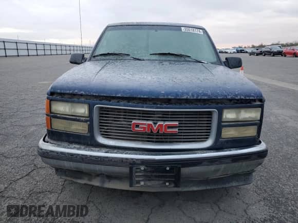 1995 GMC Sierra 1500 z VIN 2GTEC19K0S1537997, wystawiony jako Copart lot #85018174 z przebiegiem 240 831 mil mil oraz Czysty tytuł • Clean title. Historia ofert i sprzedaży dostępna na DreamBid. Obrazek 5.