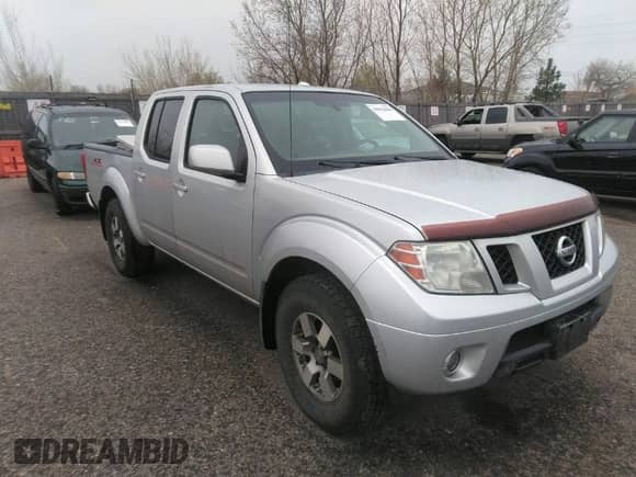2011 Nissan Frontier Pro-4X with VIN 1N6AD0EV2BC438370, listed as a IAAI auction lot 41952484 with 217,529 mi miles and . Bid and sale history available at DreamBid. Image 1.