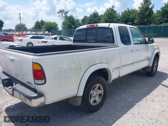 2001 Toyota Tundra Limited z VIN 5TBRT38161S219985, wystawiony jako IAAI lot #42886408 z przebiegiem 258 093 mil mil oraz . Historia ofert i sprzedaży dostępna na DreamBid. Obrazek 4.