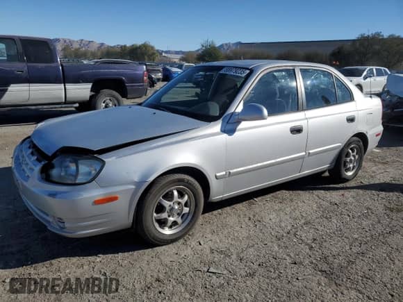 2003 Hyundai Accent GL с VIN KMHCG45C63U413388, выставлен на аукционе Copart как лот 88979235 с пробегом 240 928 миль миль и Списание • Salvage title. История ставок и продаж доступна на DreamBid. Изображение 1.