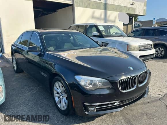 2013 BMW 7 Series 740Li with VIN WBAYE4C58DDW22540, listed as a Copart auction lot 80589825 with 115,026 mi miles and Clean title. Bid and sale history available at DreamBid. Image 1.