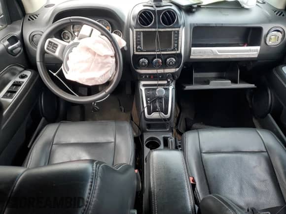 2016 Jeep Compass Latitude with VIN 1C4NJDEBXGD721806, listed as a Copart auction lot 86772214 with 137,065 mi miles and Salvage title. Bid and sale history available at DreamBid. Image 8.