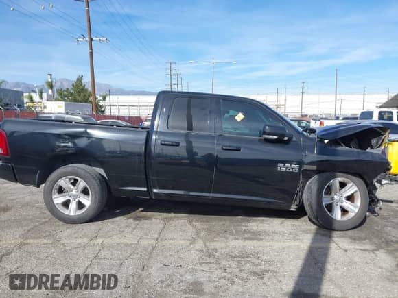 2014 Ram 1500 Sport with VIN 1C6RR6HTXES458906, listed as a IAAI auction lot 41411167 with Not provided miles and . Bid and sale history available at DreamBid. Image 13.