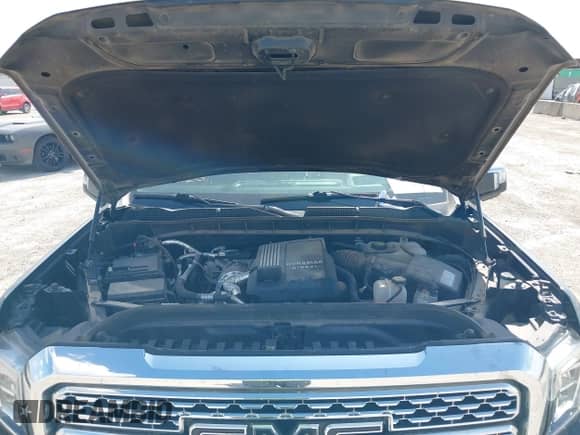 2021 GMC Sierra 1500 Denali with VIN 3GTU9FET5MG303337, listed as a IAAI auction lot 43105491 with 76,727 mi miles and . Bid and sale history available at DreamBid. Image 10.