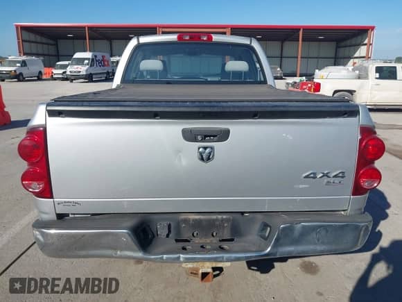 2007 Dodge 1500 SLT with VIN 1D7HU18N97J506174, listed as a IAAI auction lot 43372845 with 185,589 mi miles and . Bid and sale history available at DreamBid. Image 16.