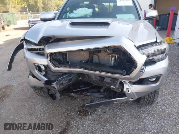 2023 Toyota Tacoma SR5 z VIN 3TMDZ5BN3PM142735, wystawiony jako IAAI lot #43182736 z przebiegiem 18 513 mil mil oraz . Historia ofert i sprzedaży dostępna na DreamBid. Obrazek 6.