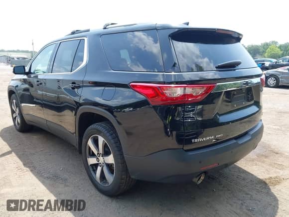 2018 Chevrolet Traverse LT with VIN 1GNEVHKW9JJ280947, listed as a IAAI auction lot 42582520 with 98,531 mi miles and . Bid and sale history available at DreamBid. Image 3.