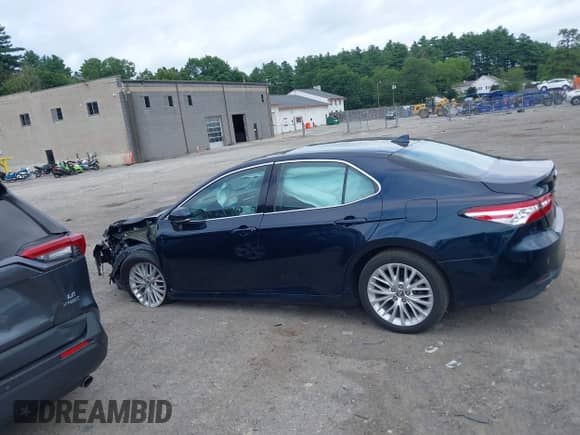 2020 Toyota Camry Hybrid XLE z VIN 4T1F31AK7LU521801, wystawiony jako IAAI lot #42707425 z przebiegiem 66 573 mil mil oraz . Historia ofert i sprzedaży dostępna na DreamBid. Obrazek 14.