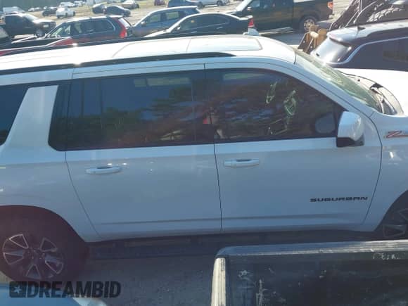 2021 Chevrolet Suburban Z71 with VIN 1GNSKDKD2MR391008, listed as a IAAI auction lot 42757375 with 59,146 mi miles and . Bid and sale history available at DreamBid. Image 13.