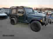 2005 Jeep Wrangler SE z VIN 1J4FA29155P363501, wystawiony jako Copart lot #80388314 z przebiegiem 97 564 mil mil oraz Czysty tytuł • Clean title. Historia ofert i sprzedaży dostępna na DreamBid. Obrazek 4.