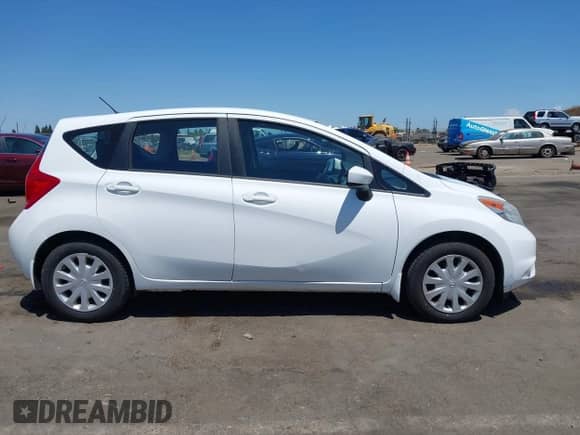 2015 Nissan Note SV z VIN 3N1CE2CP8FL415665, wystawiony jako IAAI lot #42842530 z przebiegiem 140 068 mil mil oraz . Historia ofert i sprzedaży dostępna na DreamBid. Obrazek 13.