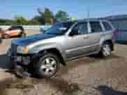 2007 Jeep Grand Cherokee Laredo with VIN 1J8GR48KX7C593322, listed as a Copart auction lot 71458485 with 166,252 mi miles and Salvage title. Bid and sale history available at DreamBid. Image 1.