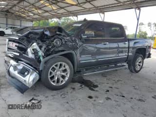 2015 GMC Sierra 1500 SLT with VIN 3GTP1VEC5FG414648, listed as a Copart auction lot 67044635 with Not provided miles and Salvage title. Bid and sale history available at DreamBid. Image 1.
