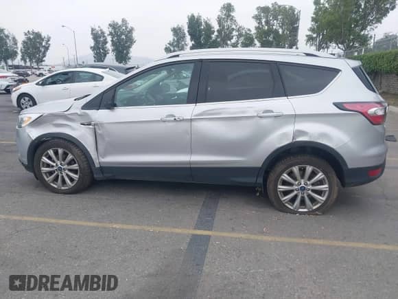 2017 Ford Escape Titanium с VIN 1FMCU0JD5HUB29838, выставлен на аукционе IAAI как лот 42354028 с пробегом 58 250 миль миль и . История ставок и продаж доступна на DreamBid. Изображение 14.