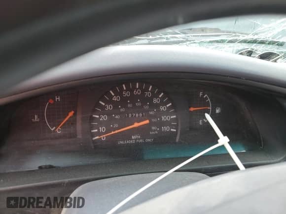 1998 Toyota Tacoma z VIN 4TAPM62N0WZ025379, wystawiony jako Copart lot #51533085 z przebiegiem 127 881 mil mil oraz Szkoda całkowita • Salvage title. Historia ofert i sprzedaży dostępna na DreamBid. Obrazek 9.