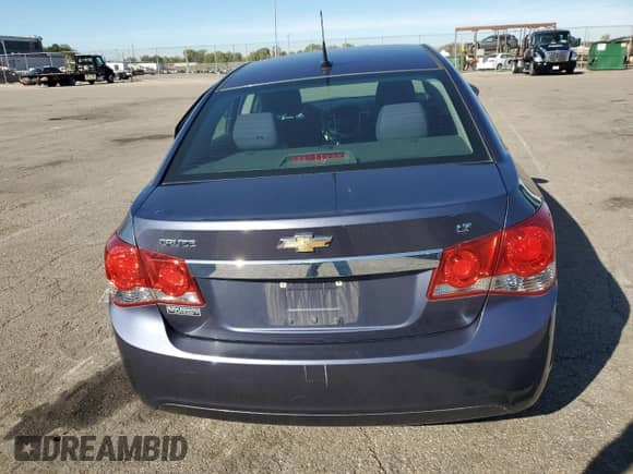 2014 Chevrolet Cruze 1LT z VIN 1G1PC5SB8E7337539, wystawiony jako Copart lot #82408735 z przebiegiem 124 655 mil mil oraz Szkoda całkowita • Salvage title. Historia ofert i sprzedaży dostępna na DreamBid. Obrazek 6.